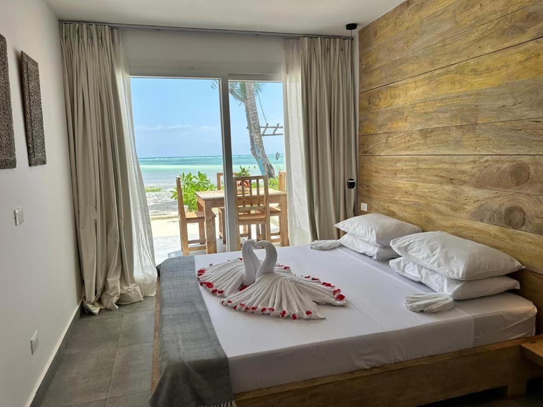 Beachfront White Pearl Zanzibarhouses